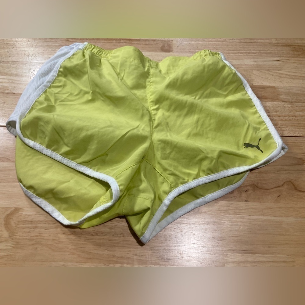 4/$2 Puma running shorts in size small. Bright neon green color with white acc